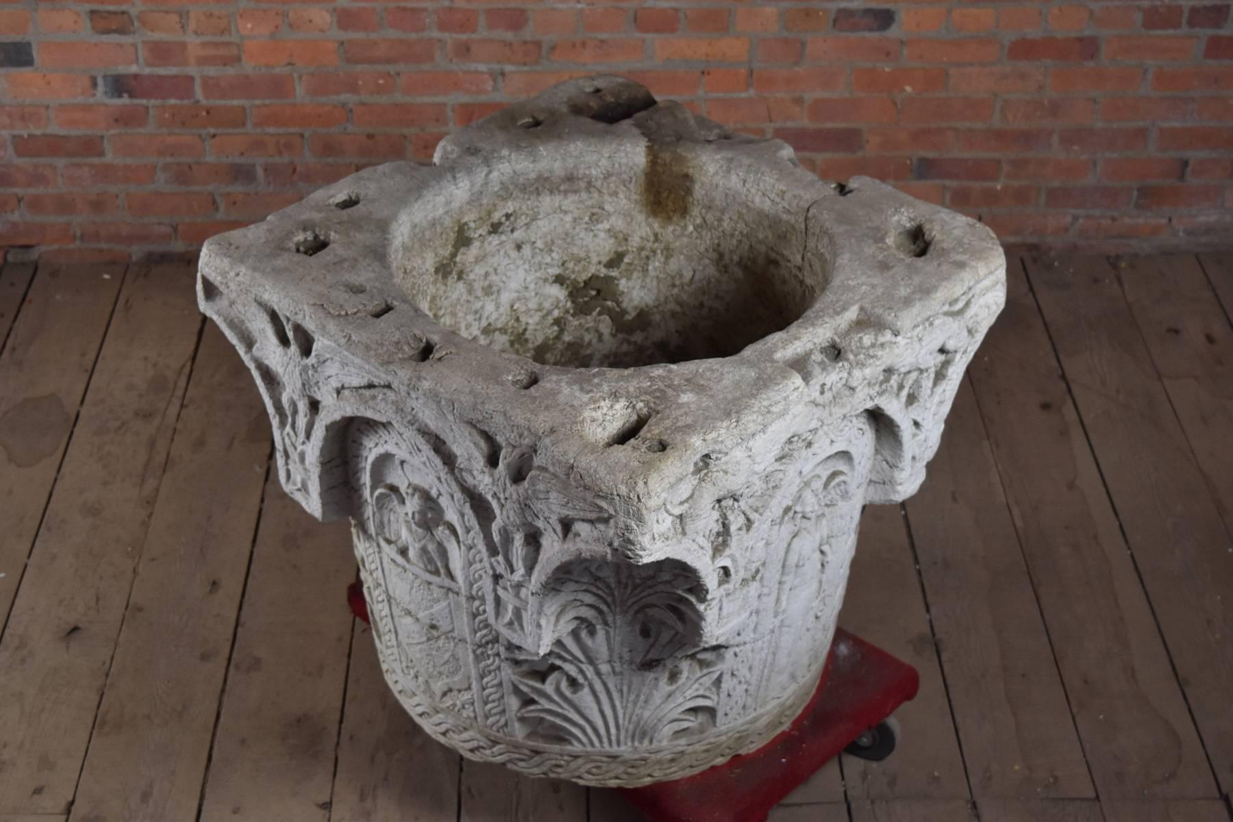 Italian Istrian stone well head from the Veneto area, elaborately carved and beautifully weathered. Renaissance style, late 19th century. The two featured family crests have not been identified so far. The very decorative object can be used in the