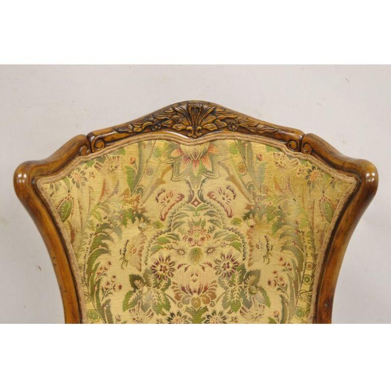 Italian Renaissance Style Carved Wingback Upholstered Armchair In Good Condition For Sale In Philadelphia, PA
