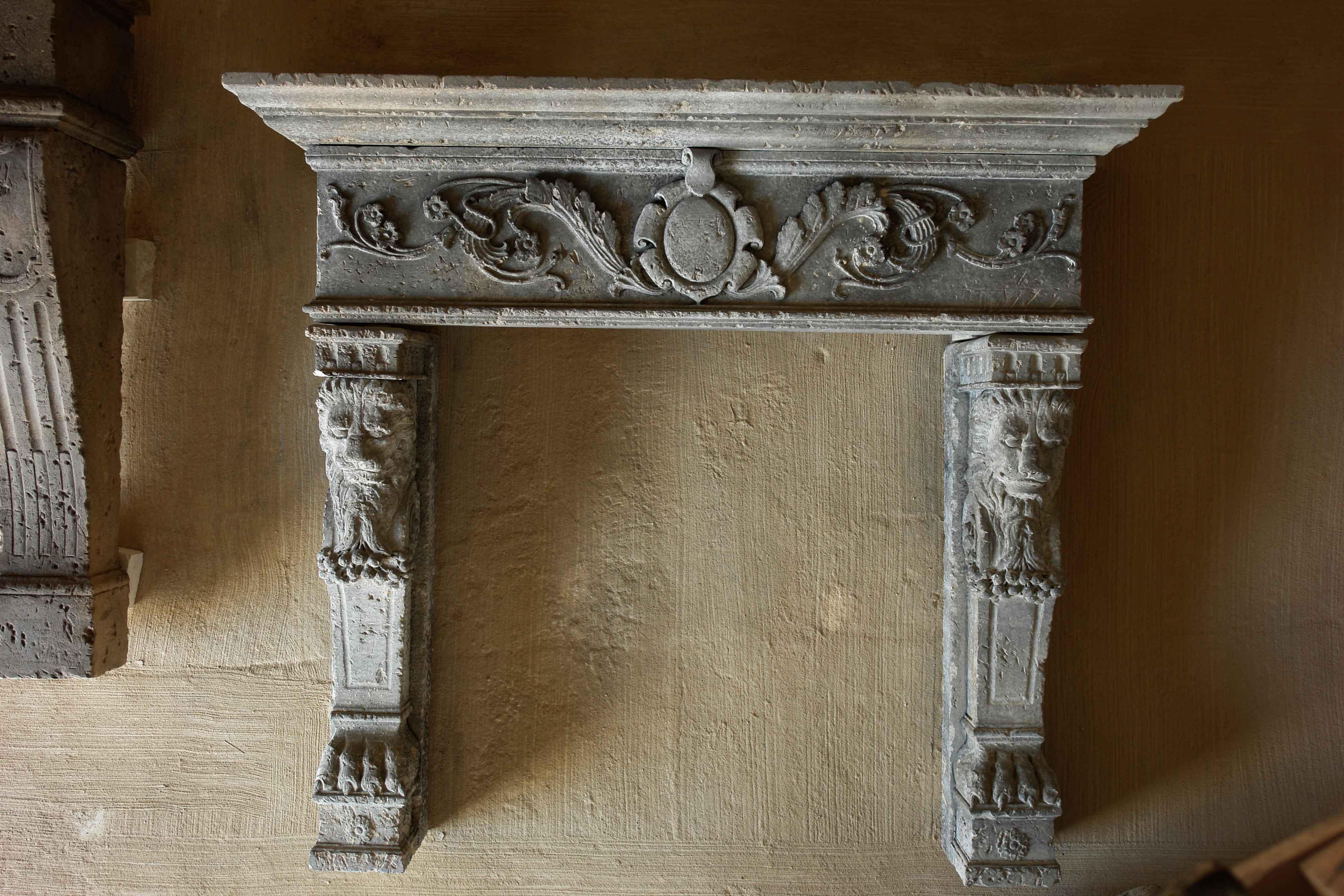 Italian Renaissance style fireplace, hand-carved in pure limestone with antique hand-finishing.
Art work with tradition. Lions on side of the leg, volutes and grapes around, acanthus leaves with medallion on front of mantel.
Deep details of the