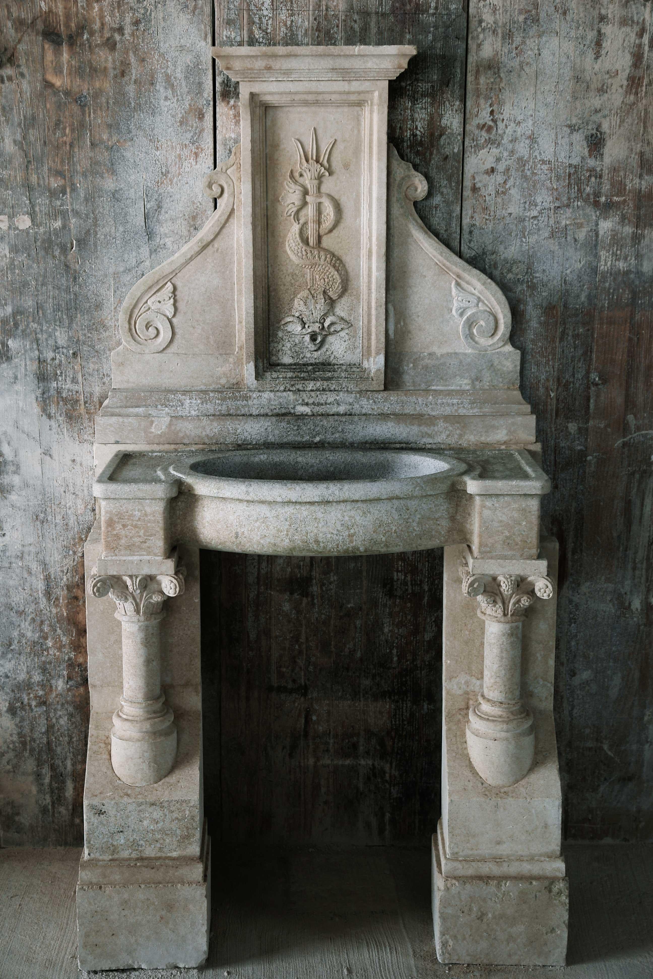 A rare quality Italian Renaissance style wall fountain, hand-carved in pure limestone with antique patina, excellent quality of art work, with columns on side incorporated in each leg.
More info on demand.
