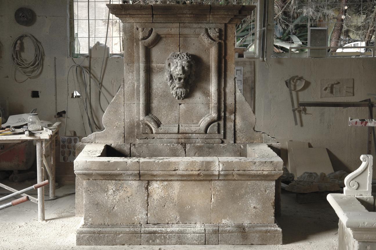 An Italian Renaissance style wall fountain, hand-carved in pure limestone with antique patina.
Exceptional art work with tradition, with deep carving on panel and basin, as well as for the heads lions hand carved as well with details.
Ready for