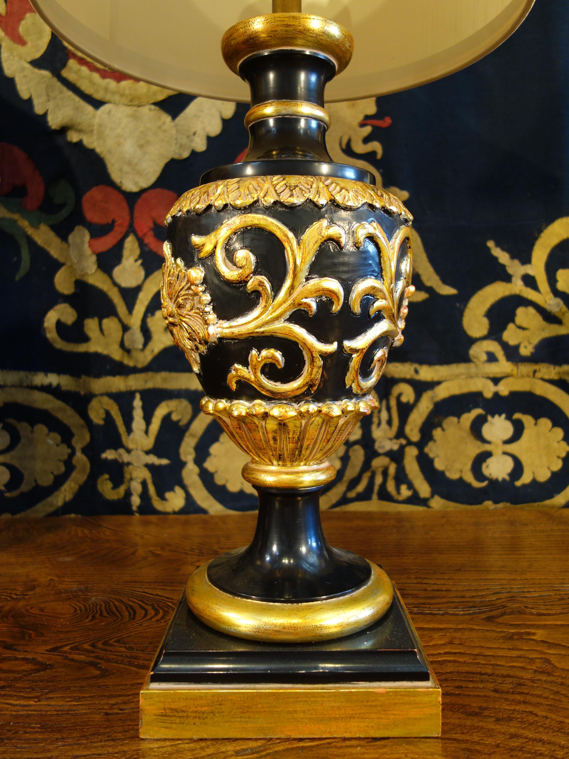 Monumental pair of Italian Renaissance Style gilt table lamps by world-renowned Marbro Lamp Company of Los Angeles USA, circa 1950.
Black lacquered and gold gilted. Each lamp measures 42.5