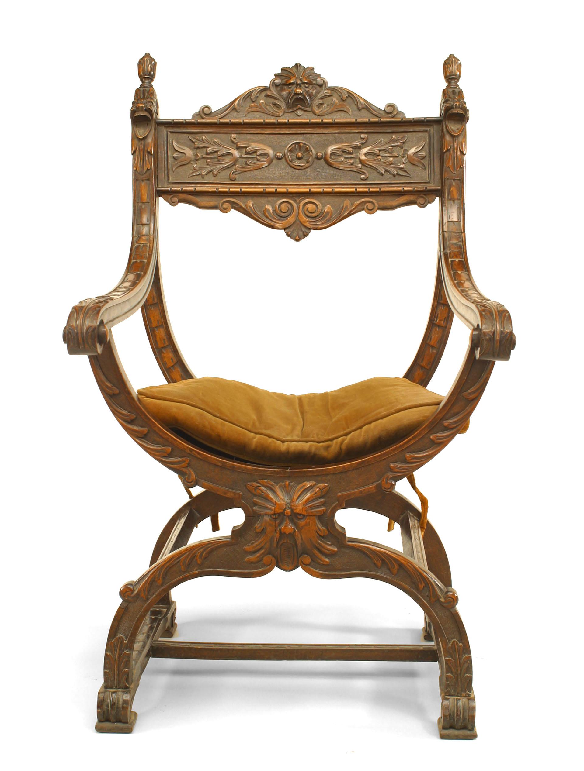 Italian Renaissance-style (19th Century) carved walnut Savonarola style armchair with carved heads. (Matching loveseat: 041408)
