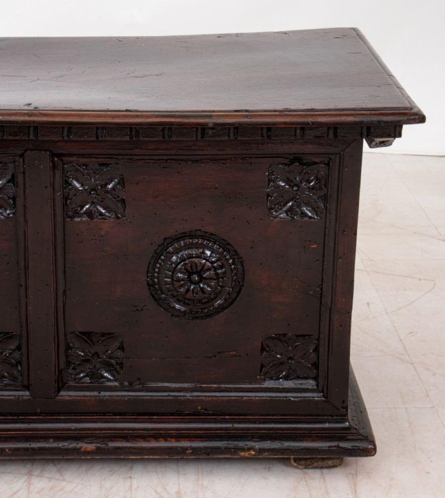 Italian Renaissance Style Walnut Cassone or Chest, circa 19th century or later, rectangular with hinged lid above a carved and decorated chest on moulded plinth. 18