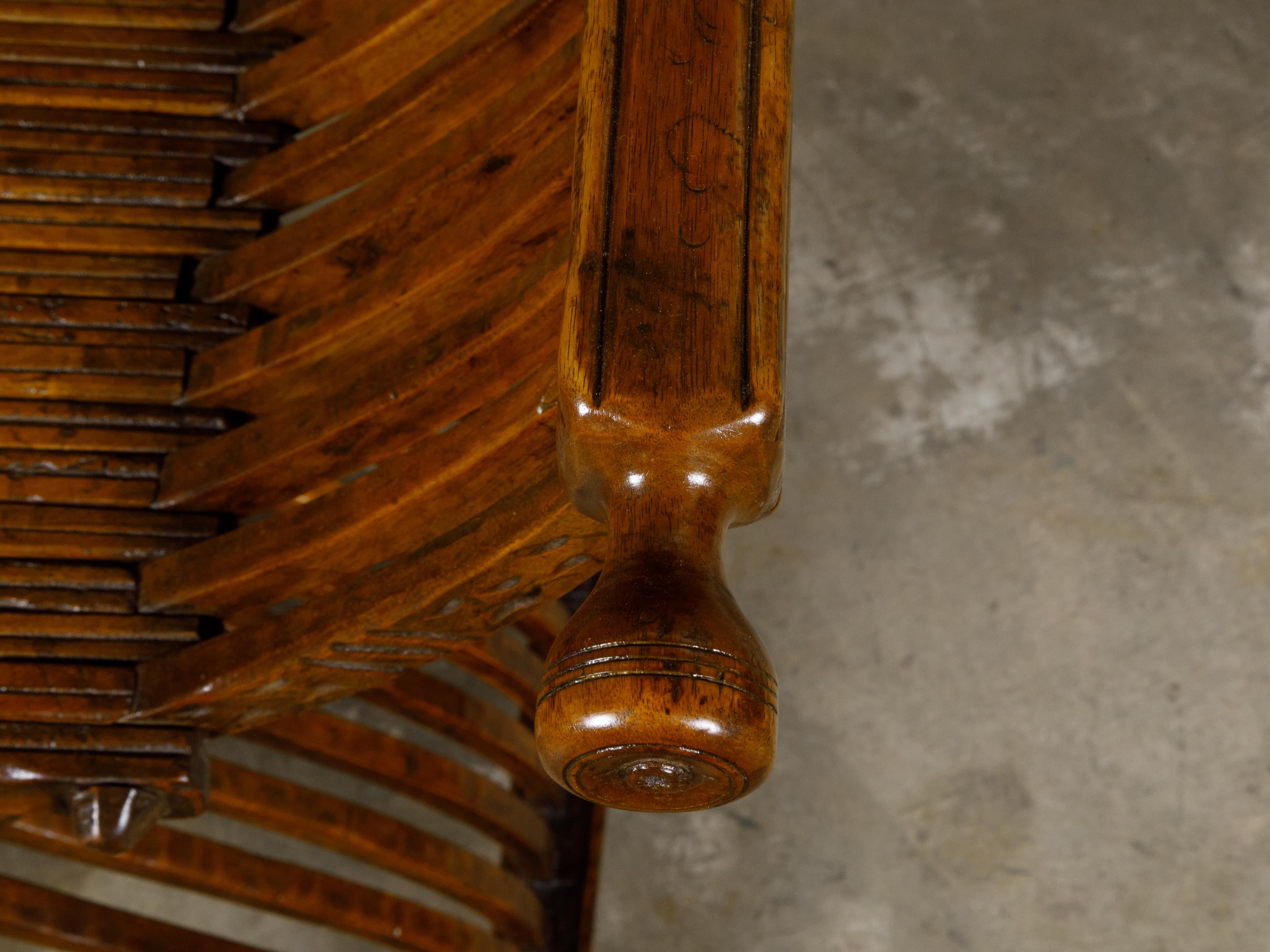 Carved Italian Renaissance Style Walnut Savonarola Folding Chair circa 1900 For Sale