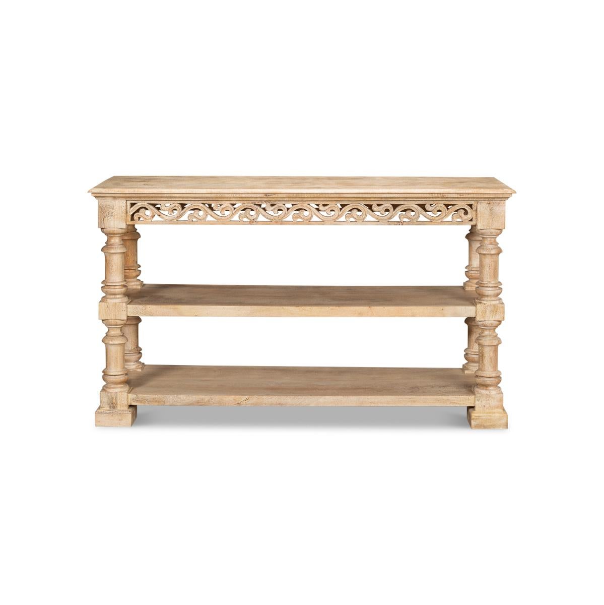 Introducing the Italian Renaissance three-tier console table, a stunning piece of furniture that will elevate any room in your home. Crafted from beautiful mango wood, this console table features a natural Sienna finish that adds warmth and