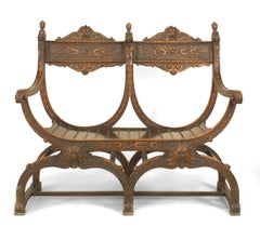 Poltrona Savonarola in legno di noce del Rinascimento italiano