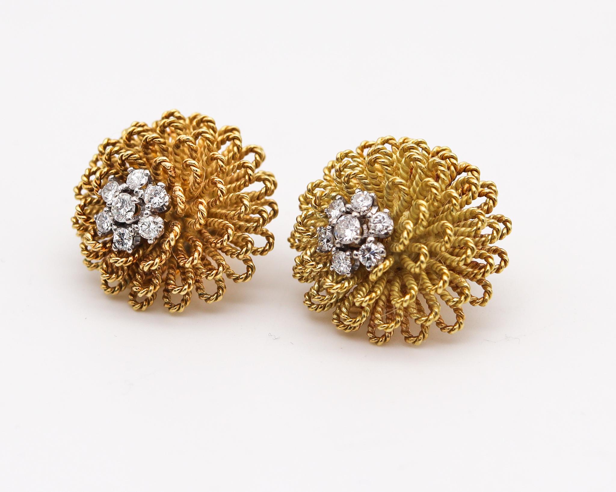 Retro modern diamond cluster earrings.

Beautiful pair of bombe textured clip-on earrings, created in Italy during the post war period, back in the early 1960. They was carefully crafted with an intricate pattern of twisted wires in solid yellow