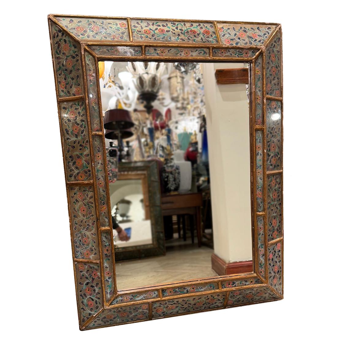 A circa 1960's Italian mirror with floral motif.

Measurements:
Height: 31.75