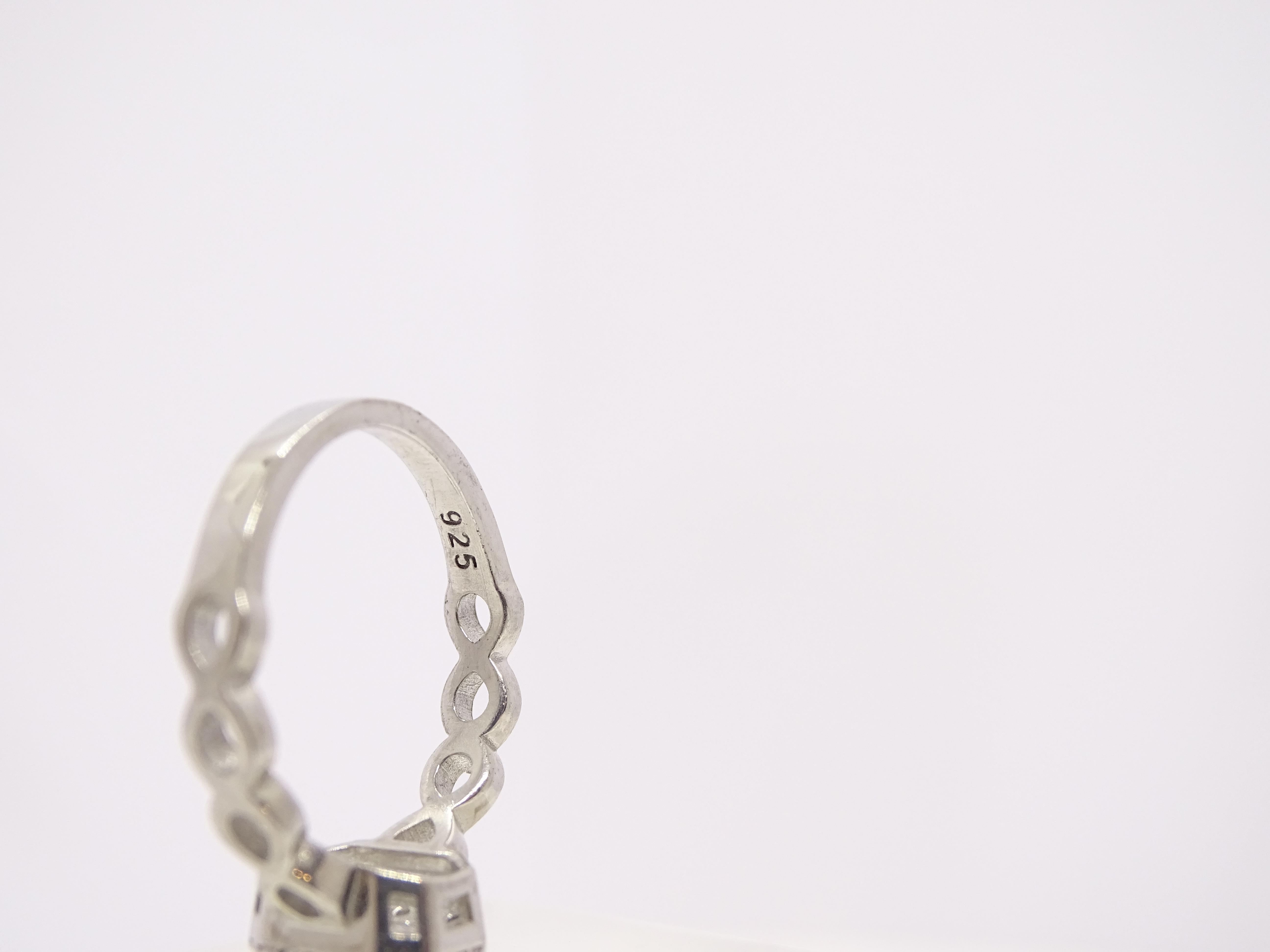 Italian ring in sterling silver and zirconite. Central zirconite emerald cut 7