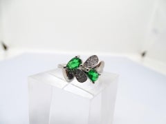 Italian ring in sterling silver, zircons and emerald root