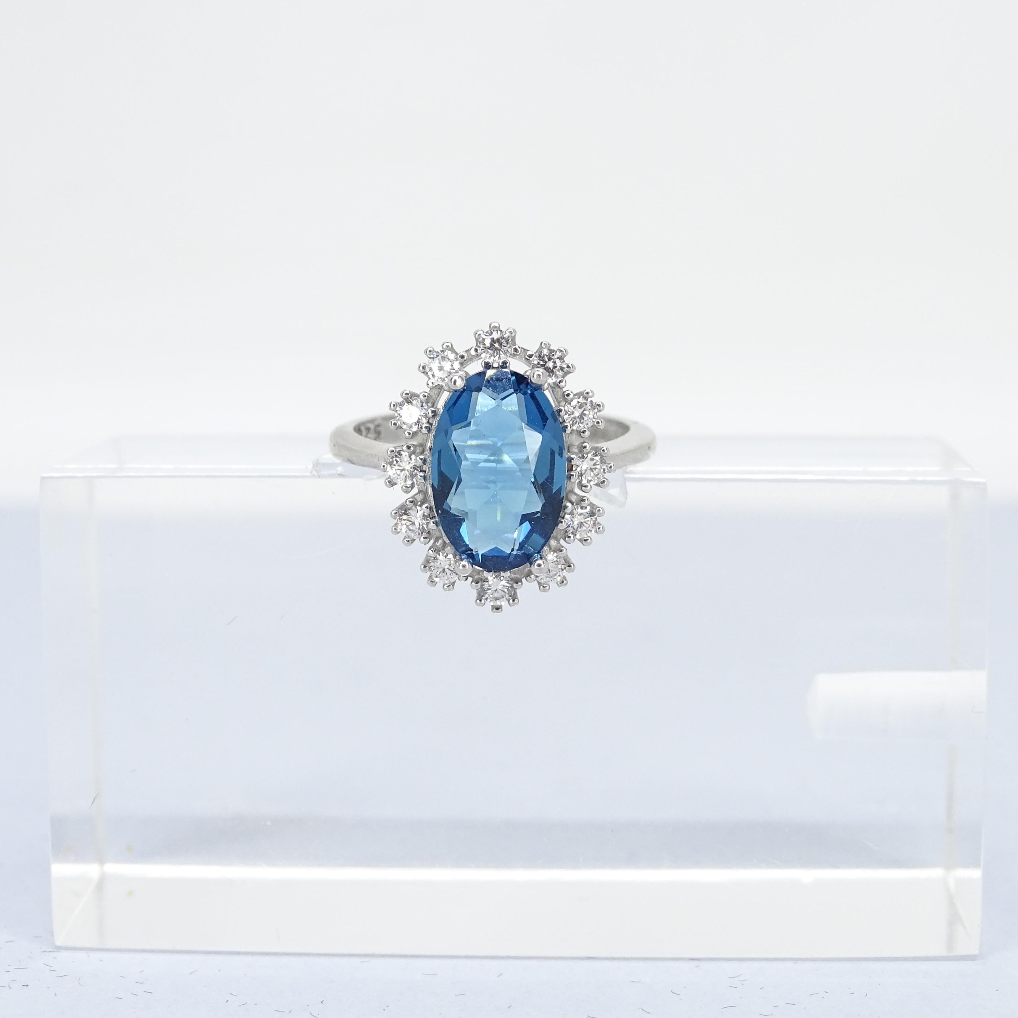 Brilliant Cut Italian Ring with sapphire root, 925 sterling silver and zircons For Sale