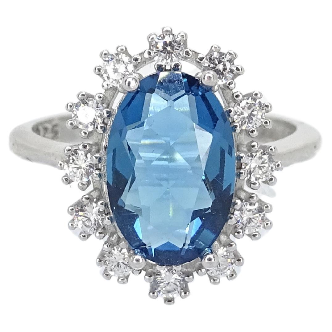 Italian Ring with sapphire root, 925 sterling silver and zircons For Sale