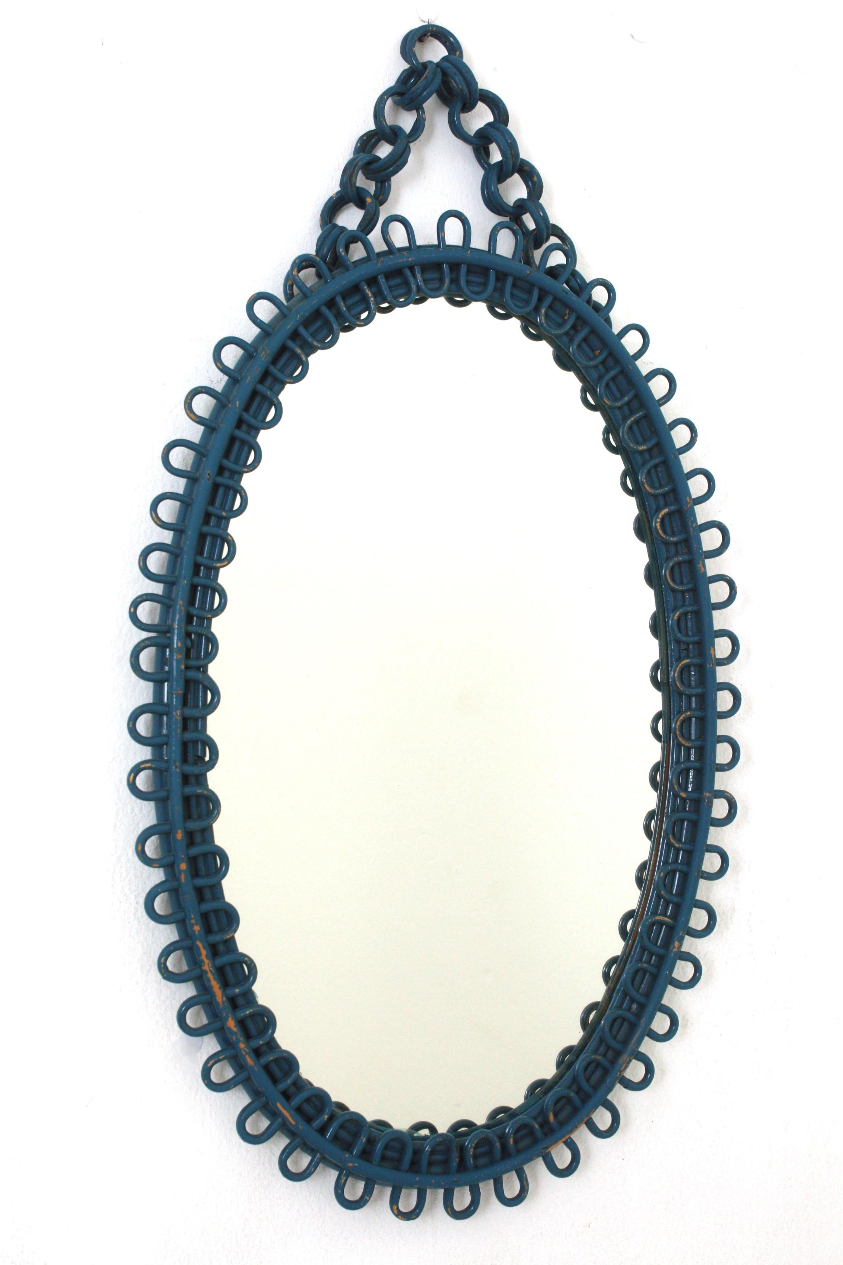 Midcentury Blue Patinated Franco Albini Rattan Oval Mirror
___________________________________________________________
A highly decorative oval Mid-Century Modern mirror with undulated rattan frame attributed to Franco Albini, Italy, 1950s.
Blue
