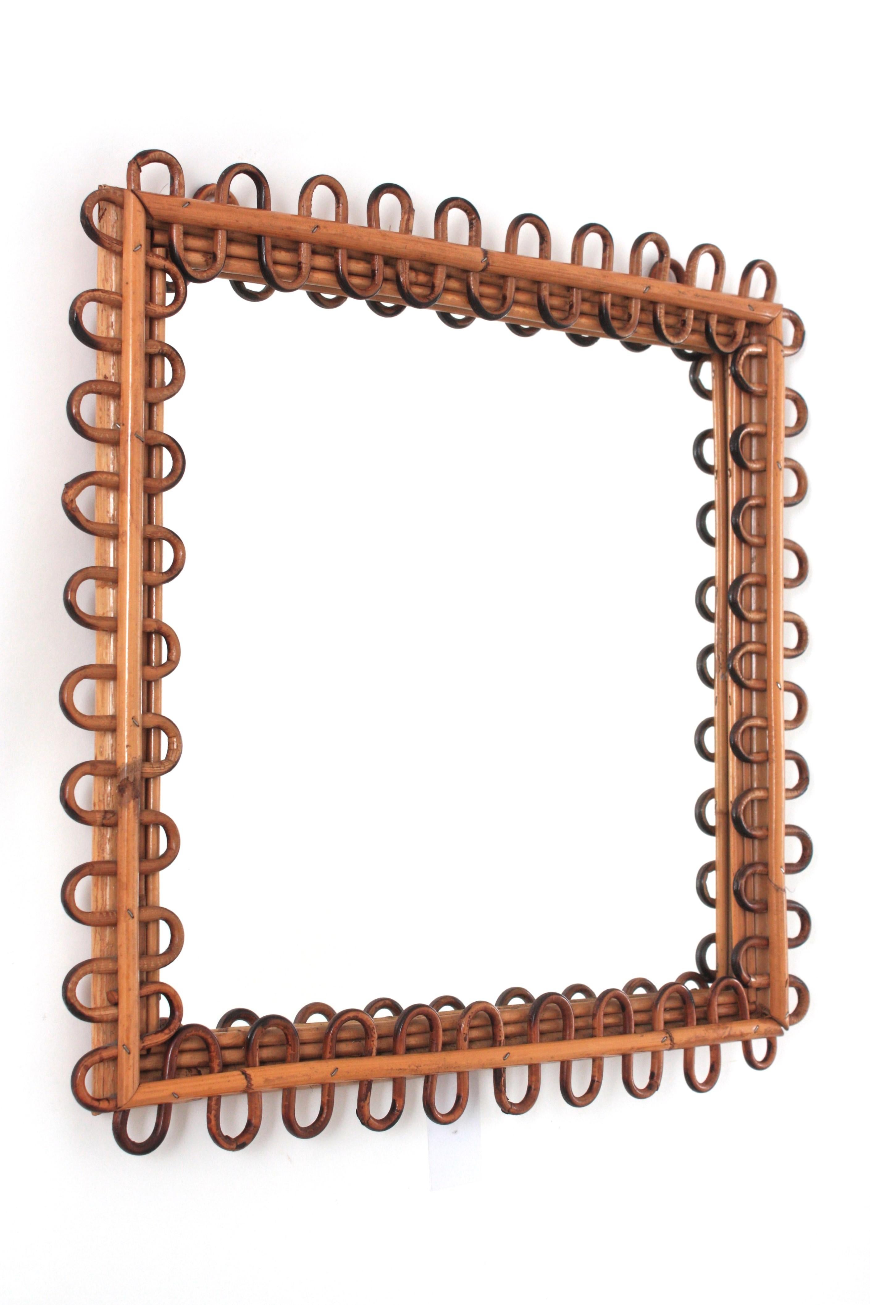 Midcentury Franco Albini Rattan Mirror
___________________________________________________________
A highly decorative squared Mid-Century Modern mirror with undulated rattan frame attributed to Franco Albini, Italy, 1950s.
Very beautiful placed