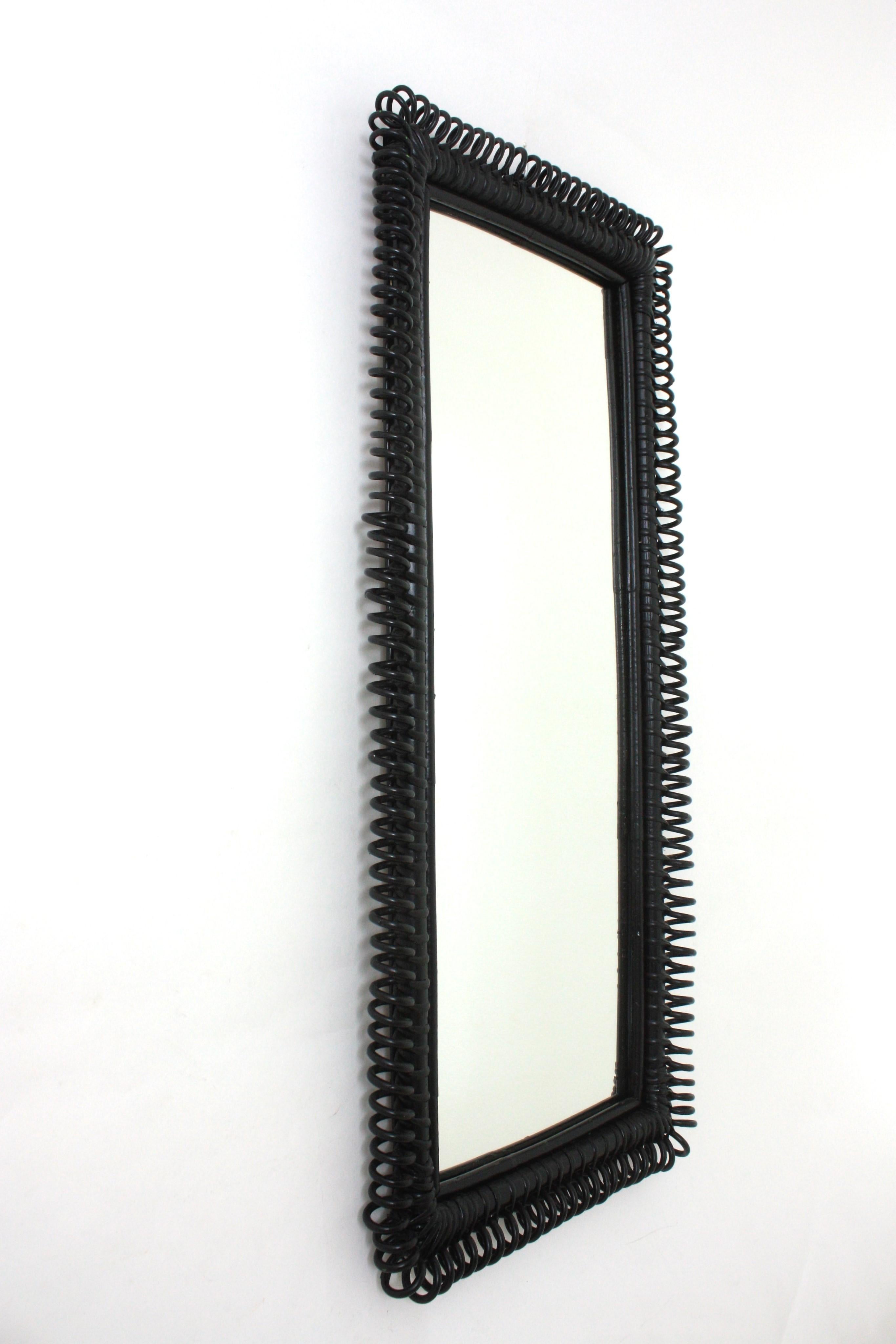 Hand-Crafted Italian Riviera Franco Albini Rattan Wall Mirror, Black Patina, Loop Design For Sale