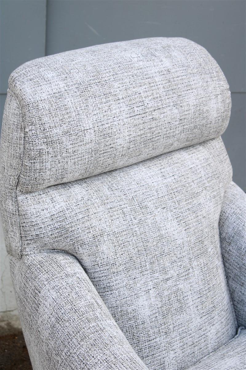 Metal Italian rocking and swivel armchair from 1970 in fabric and metal For Sale