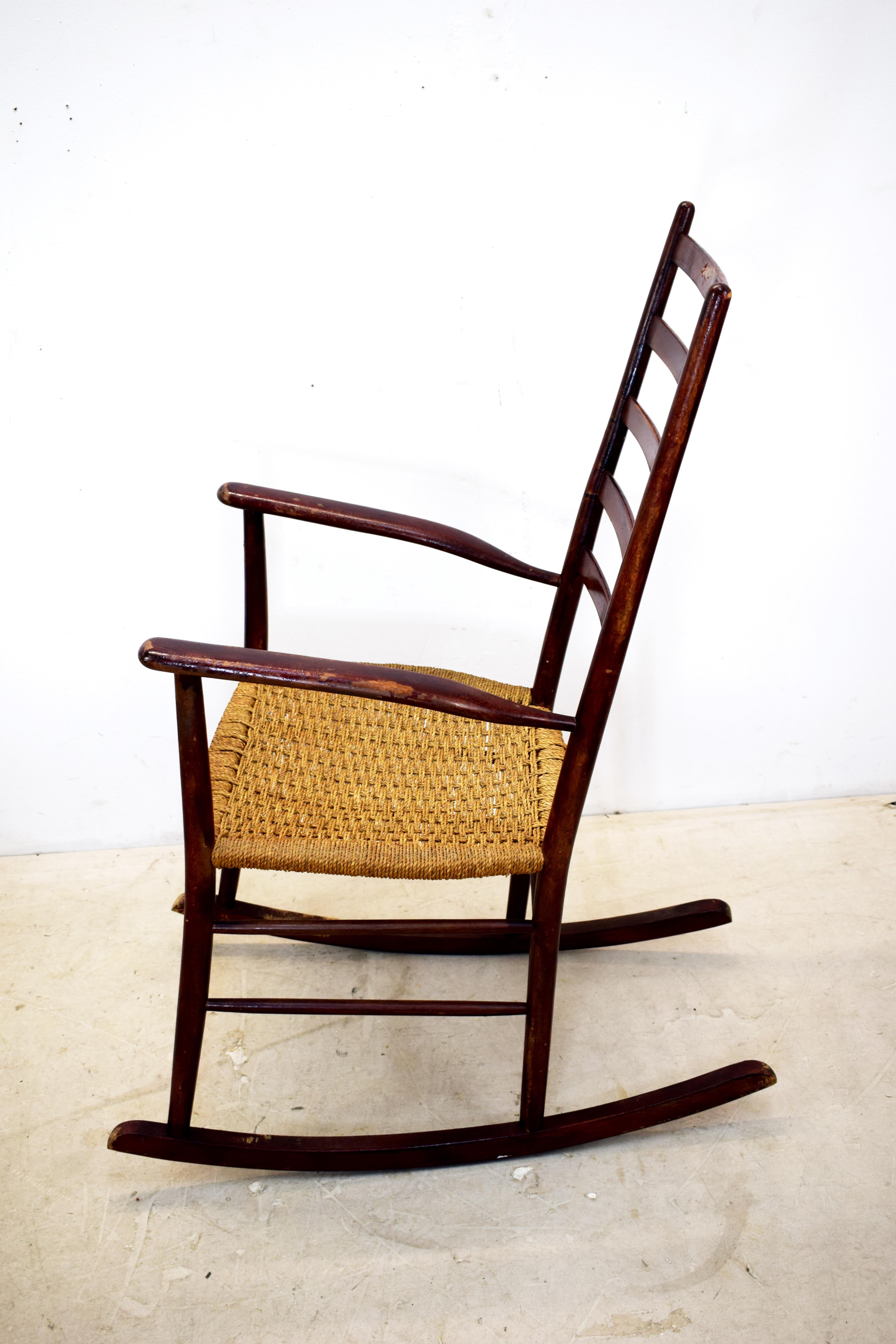 Italian rocking chair, Paolo Buffa style, 1940s.
Dimensions: H=106 cm; W= 80 cm; D= 46 cm.