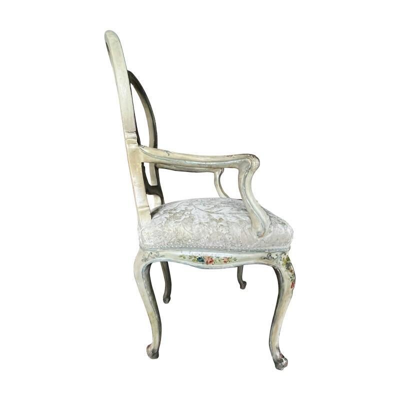 French velvet fabric by Sabina Baxton.
Provenance: Christies, sale number 9214
Rococo polychrome painted armchair from Venice.

Silk velvet damask upholstered seat.
Incurved acanthus-carved crest-rail and pierced asymmetrical rocaille splat above a