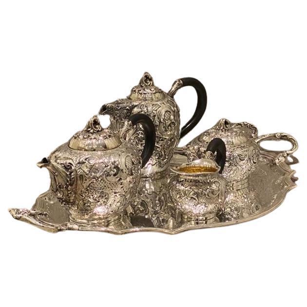 Each piece is of heavy gauge, of baluster form. All the pieces are hand chased with flowers and foliage in the rococo style this is possibly one of  the finest rococo sets we have seen. The entire service is consisting of: a coffeepot, teapot,