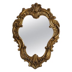 Specchio rococò italiano in legno dorato intagliato
