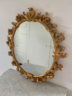 Italian Rococo Carved Giltwood Round Mirror