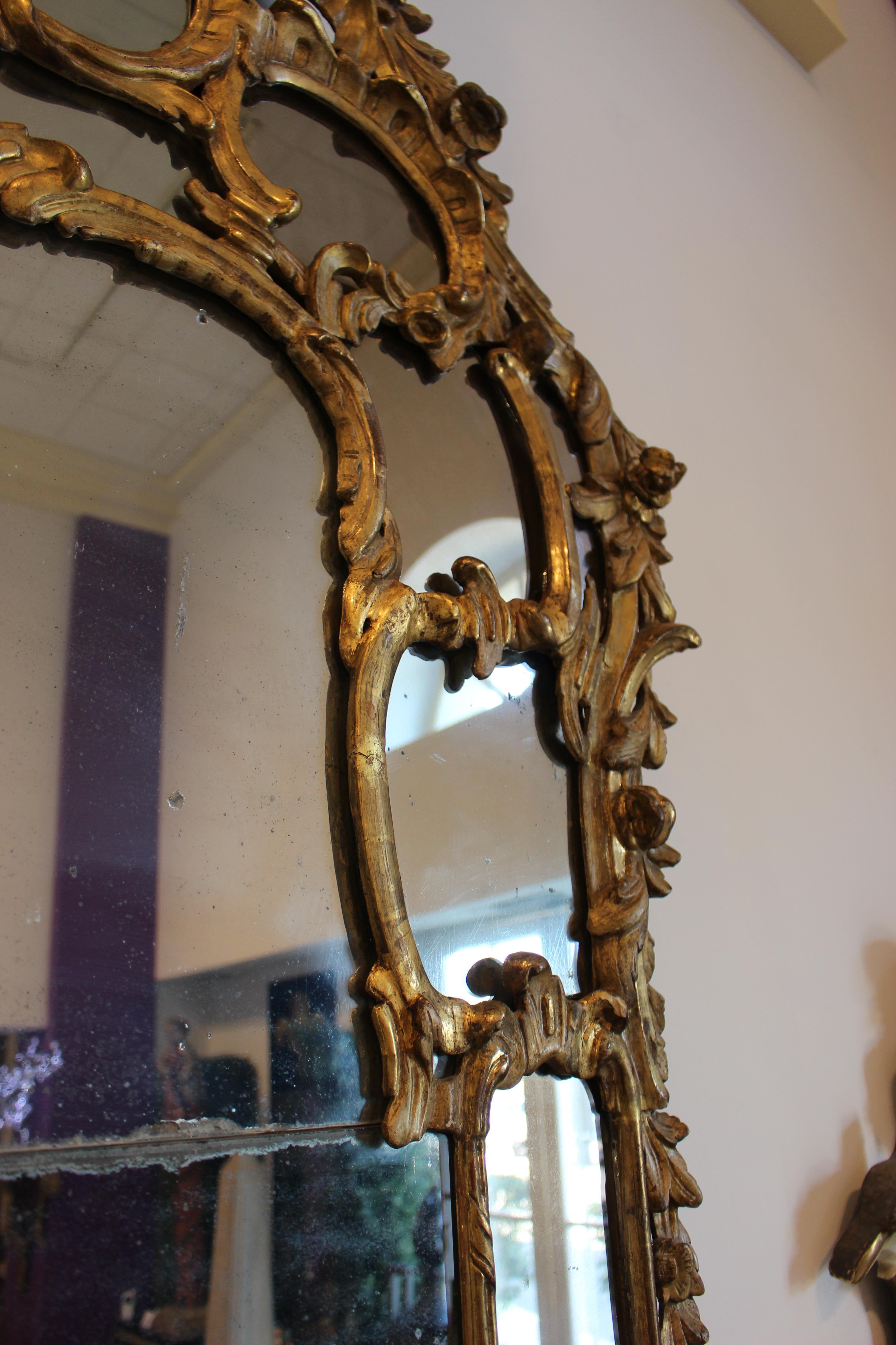 Mid-18th Century Italian Rococo Giltwood Mirror For Sale