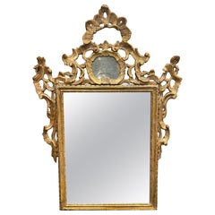 Miroir mural italien rococo en bois doré, 18ème siècle