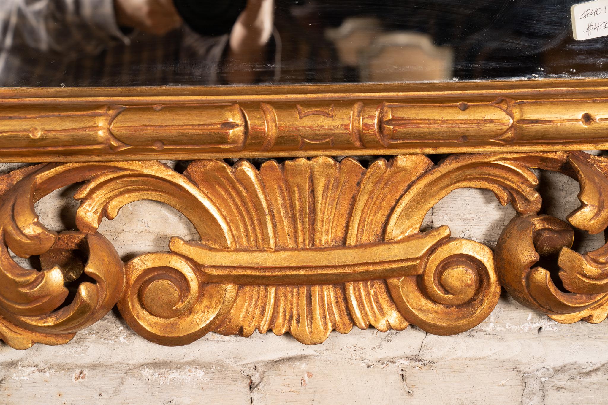 Italian Rococo Heavily Carved Gold Leaf Mirror, 20th Century, Pair Available In Good Condition For Sale In New Orleans, LA