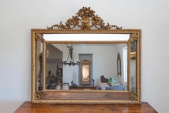 Italian Rococo Style 19th Century Giltwood Pareclose Mirror with Carved Crest