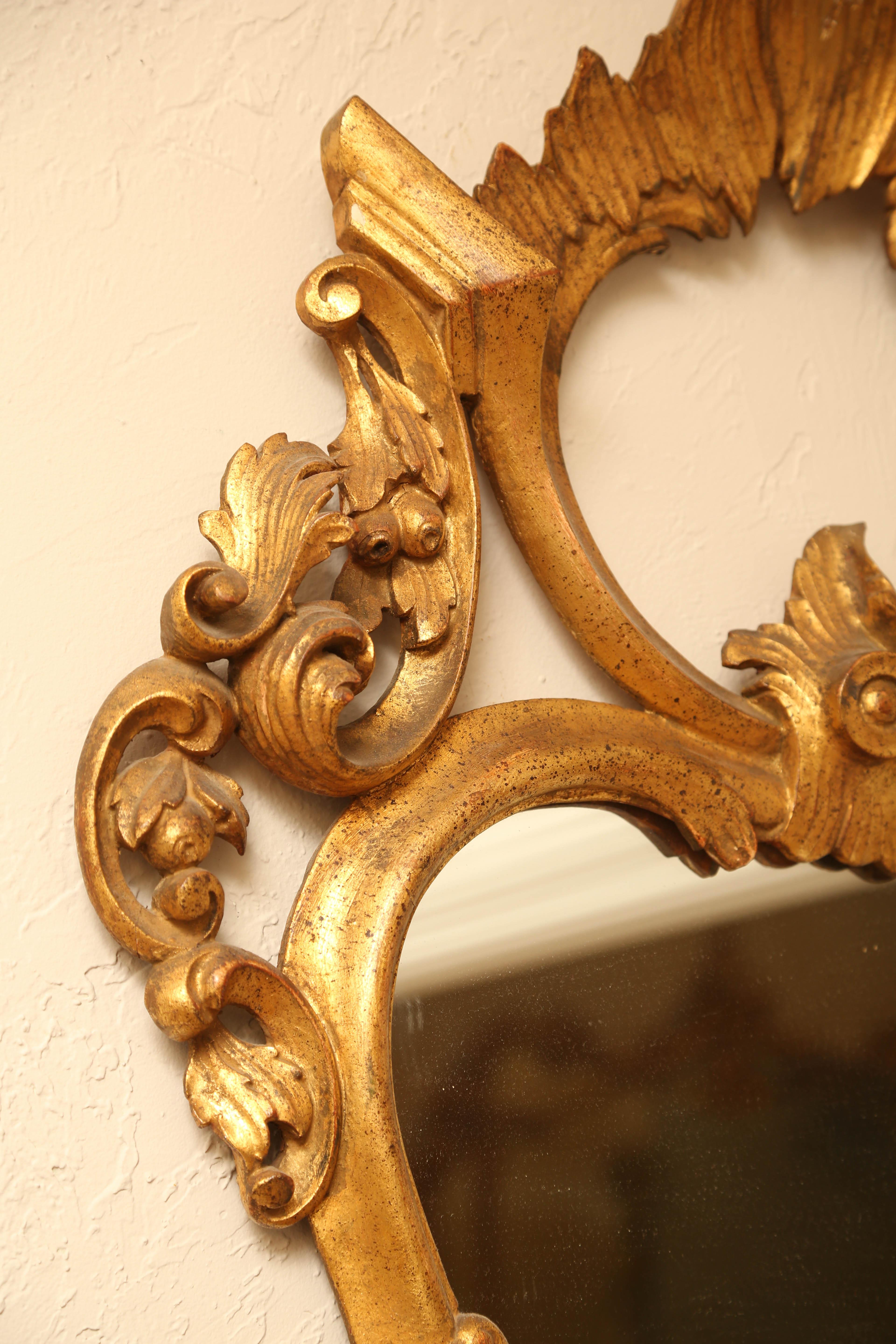 Italian Rococo Style Carved and Gilded Mirror In Good Condition For Sale In West Palm Beach, FL
