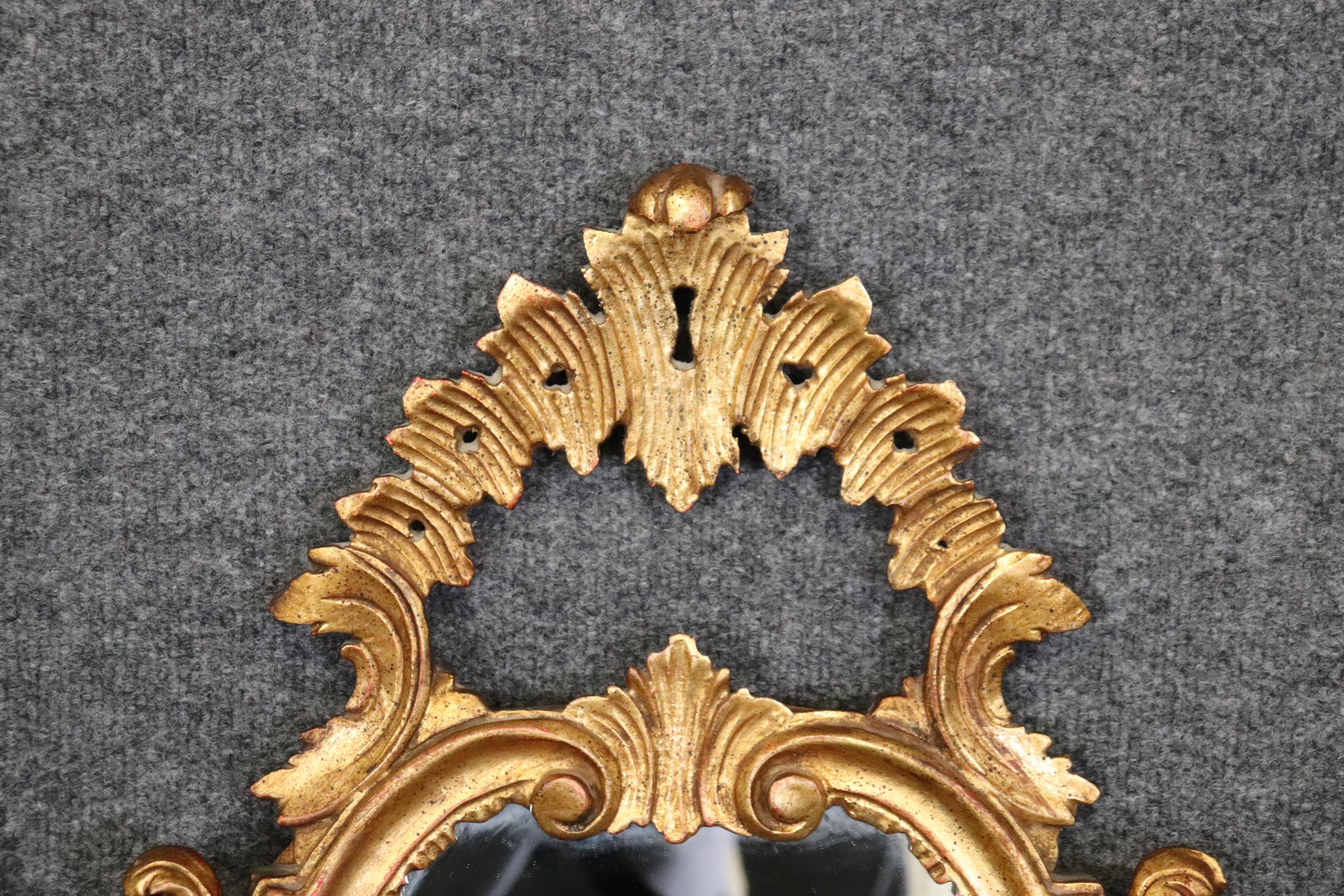 Italian Rococo Style Carved Gold Gilt Wall Hanging Mirror In Good Condition For Sale In Swedesboro, NJ
