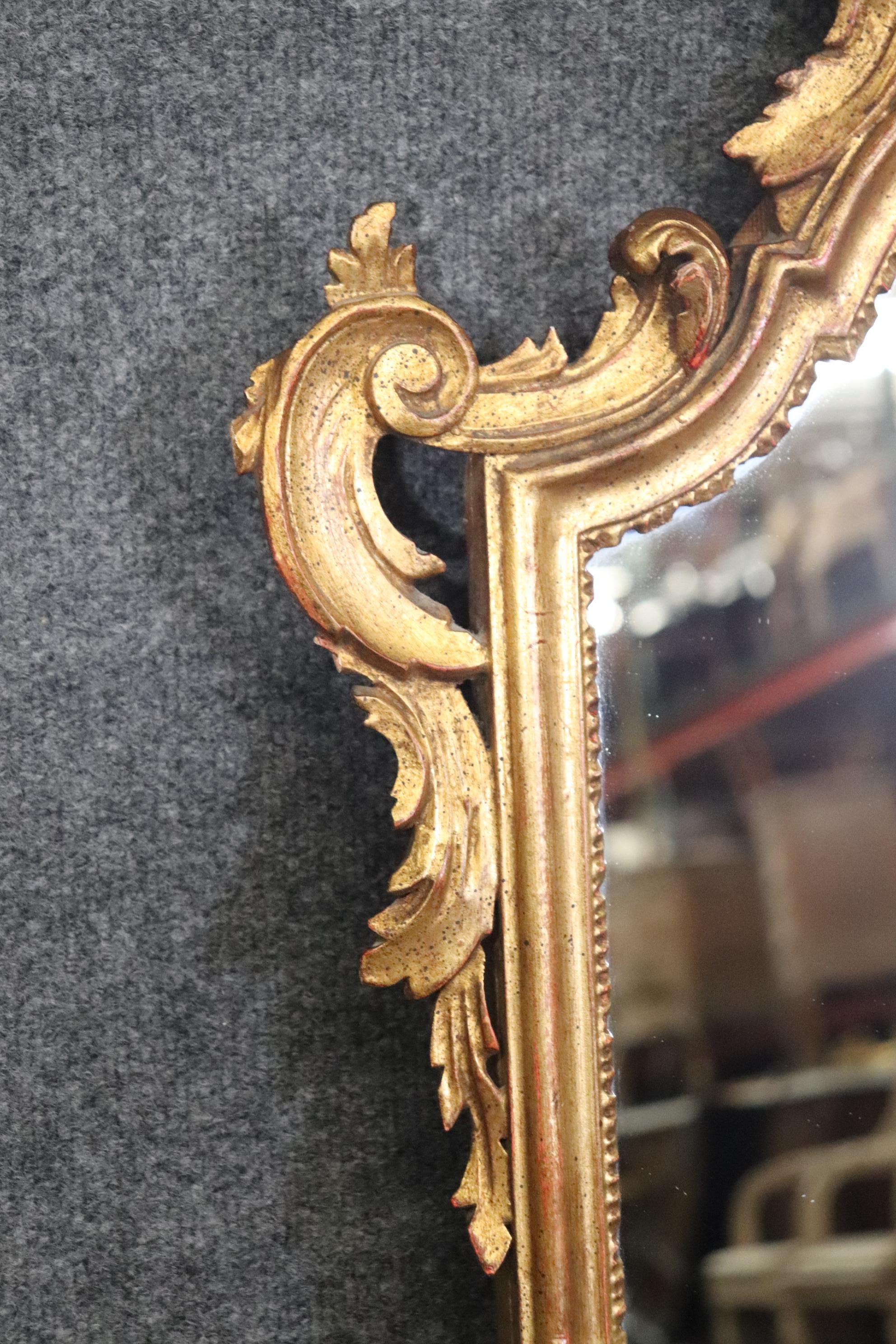 20th Century Italian Rococo Style Carved Gold Gilt Wall Hanging Mirror For Sale