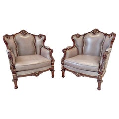 Vintage Italian Rococo Style Carved Wood Bergere chair with Leather upholstery, a Pair