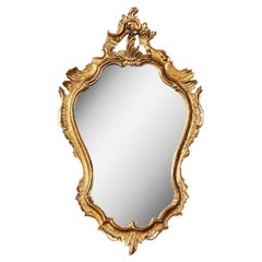 Miroir en bois doré de style rococo italien avec feuilles d'acanthe sculptées