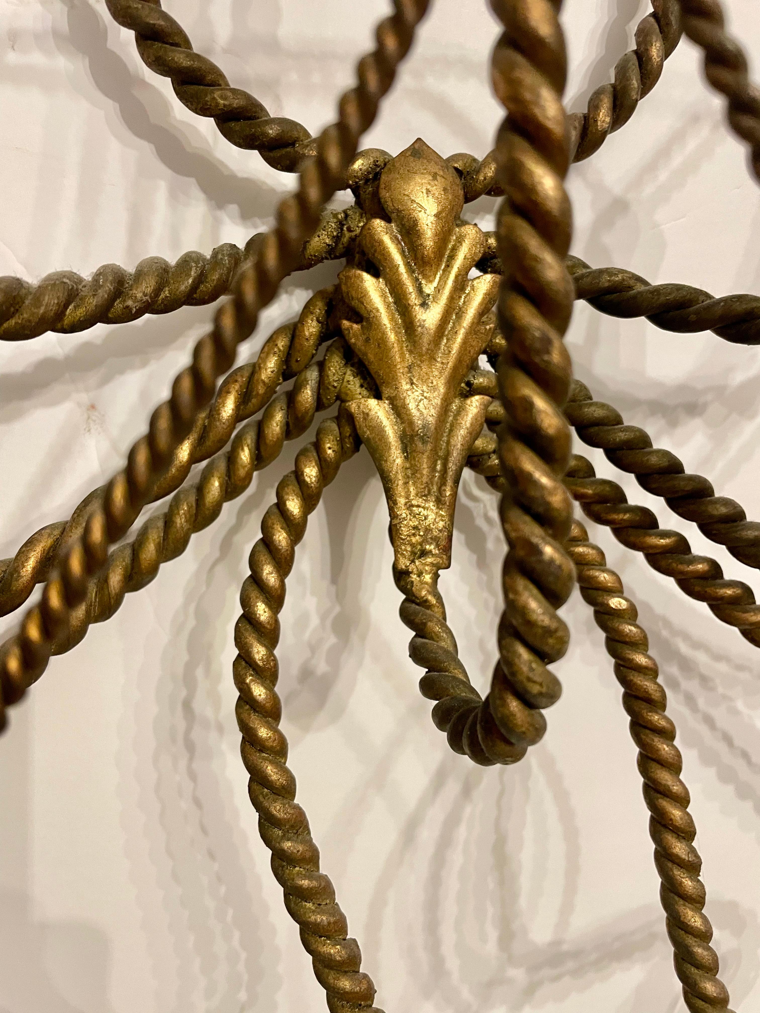Italian Rope And Tassel Candle Wall Sconce with original Gold Gilt finish. Holds seven candles. Measures 40
