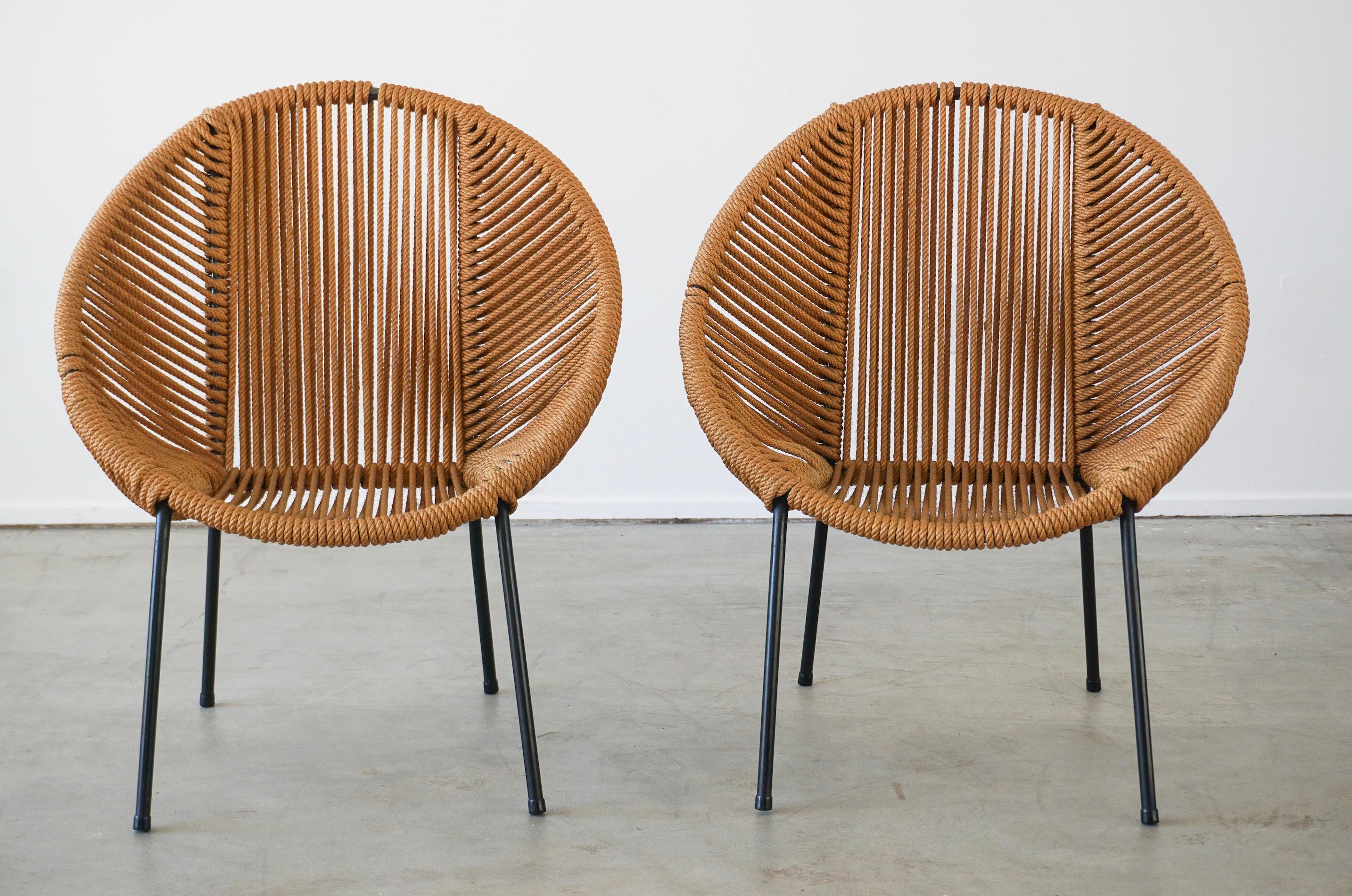 Pair of Italian rope chairs with circle hoop iron frame and rope.