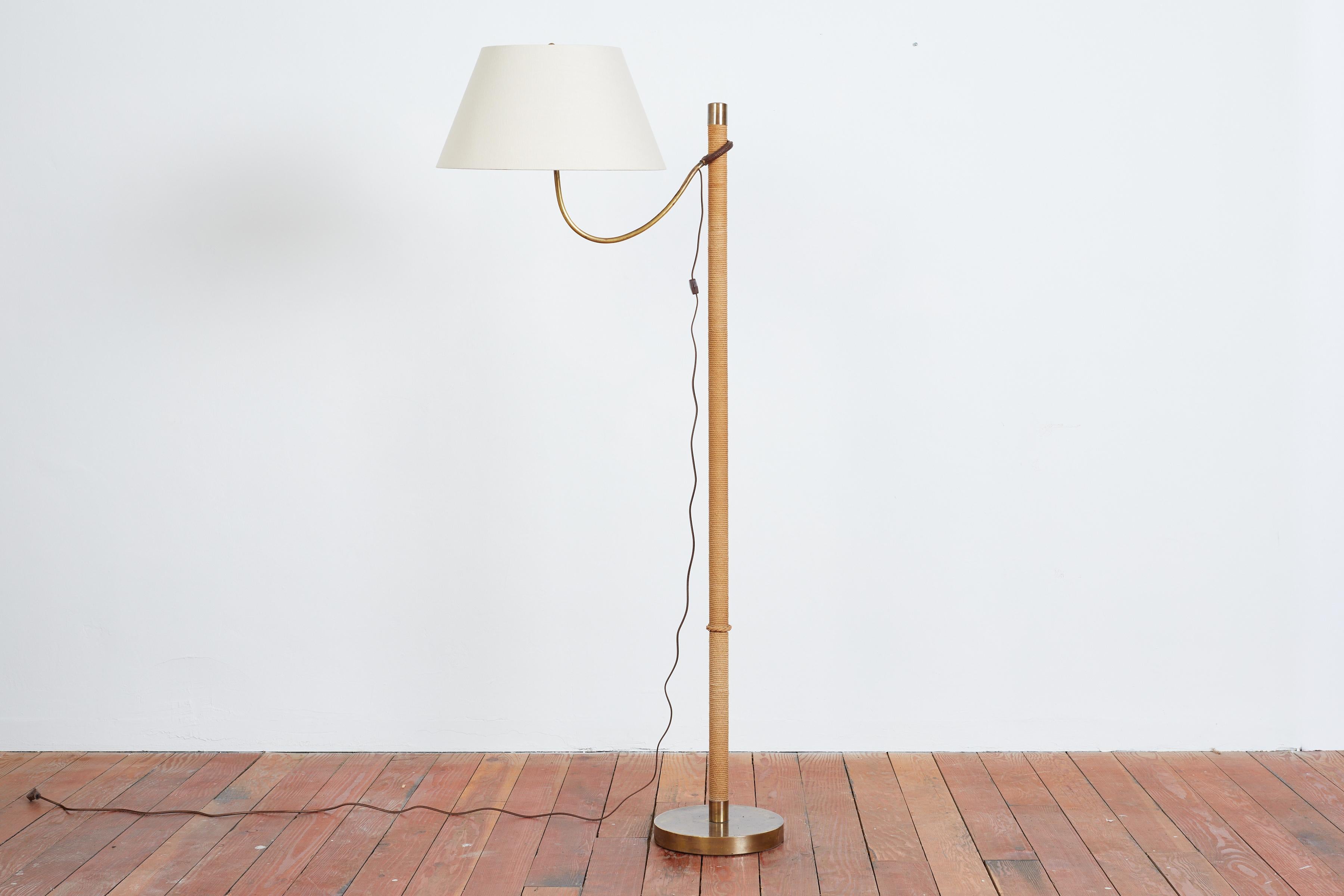 Incredible Italian floor lamp - Italy, 1950s 
Woven rope base with adjustable brass arm and original brown leather mechanism that keeps arm in place. 
New silk shade - 
