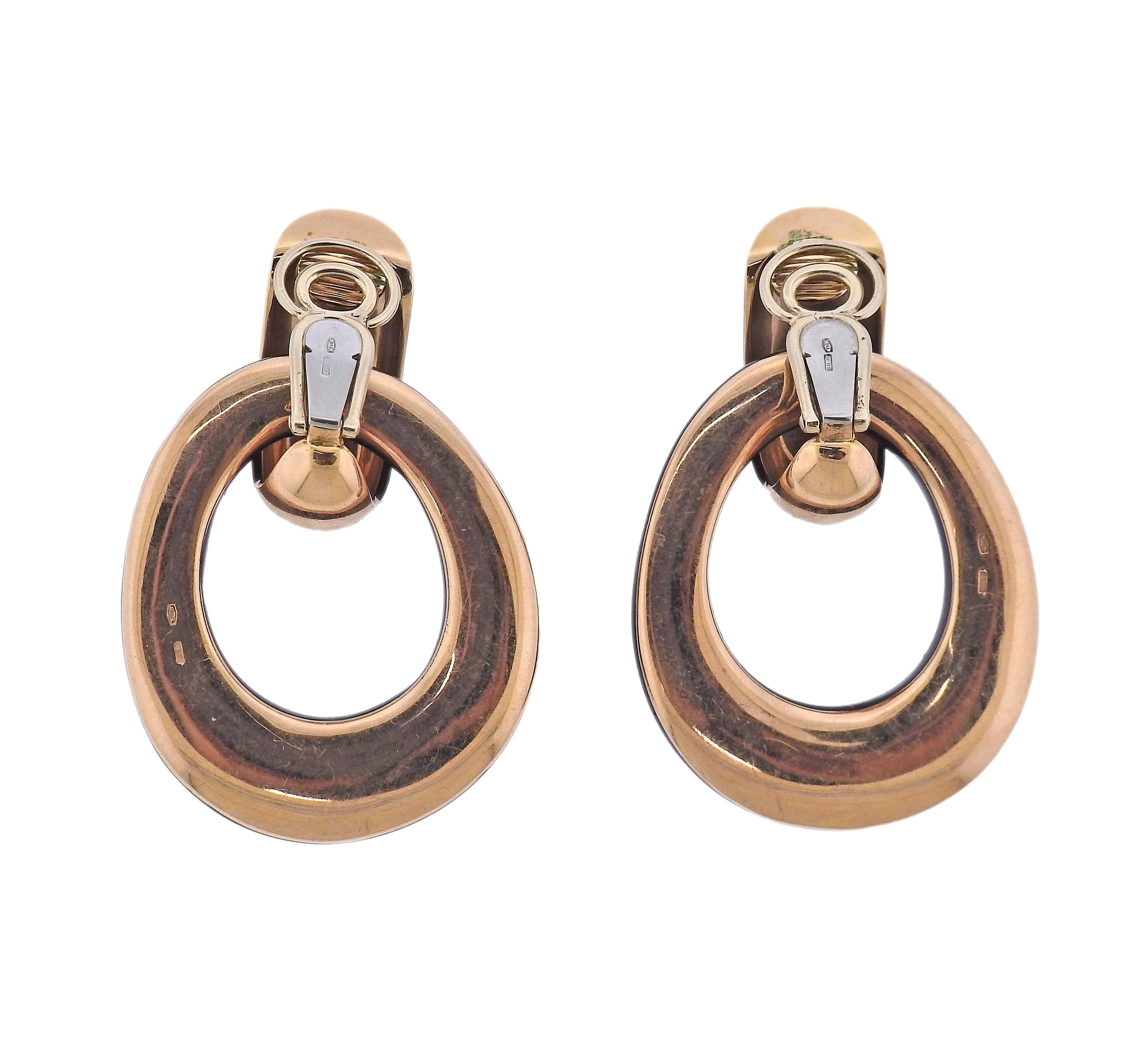 Italian made 18k rose gold doorknocker earrings, with removable ebony wood  drops, and enamel inlayed top. Earrings measure 2.25