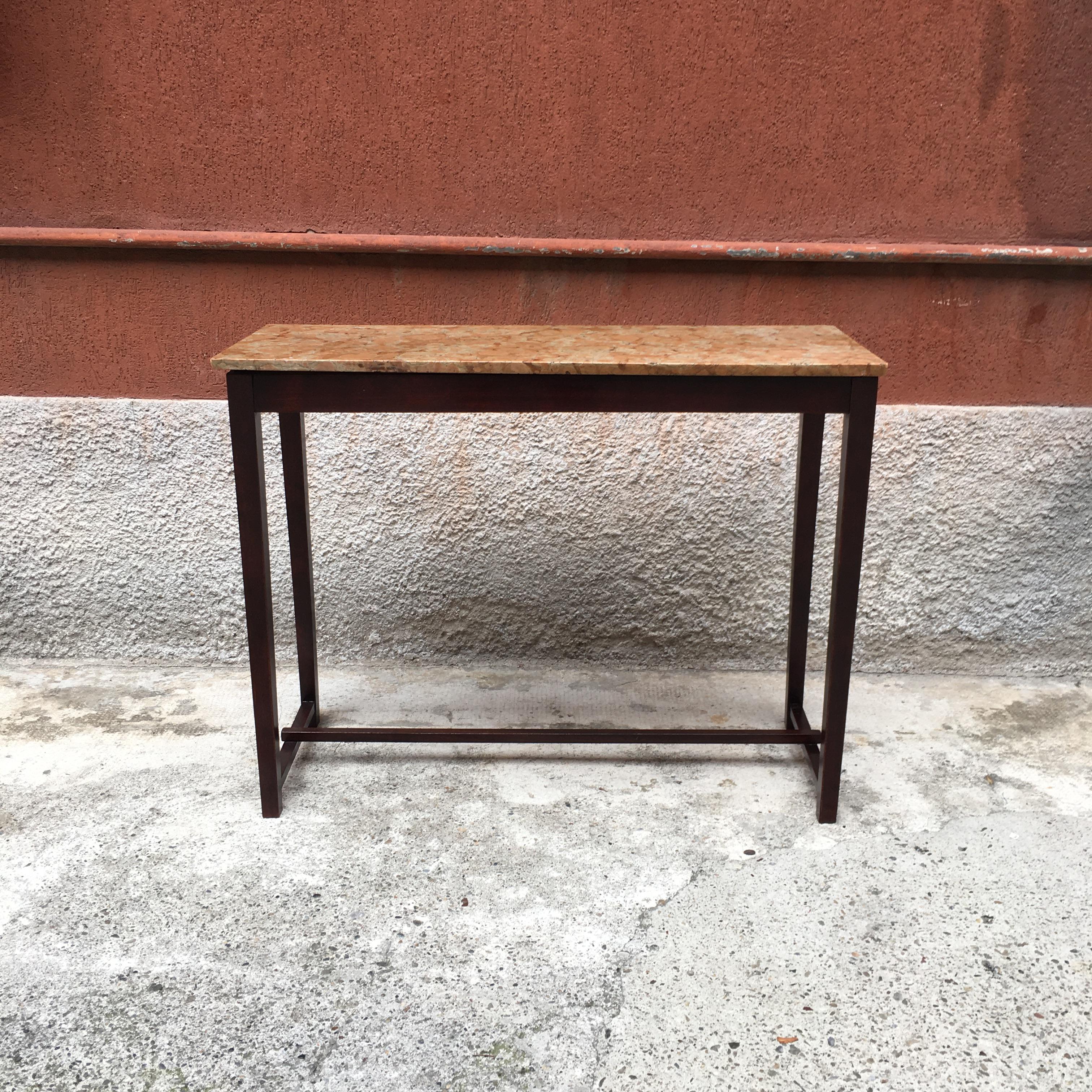 Italian mid-century wood and marble console, 1950s
Italian console with dark solid wood frame and marble top

Entirely restored with only one defect on the marble

103x40x80h cm