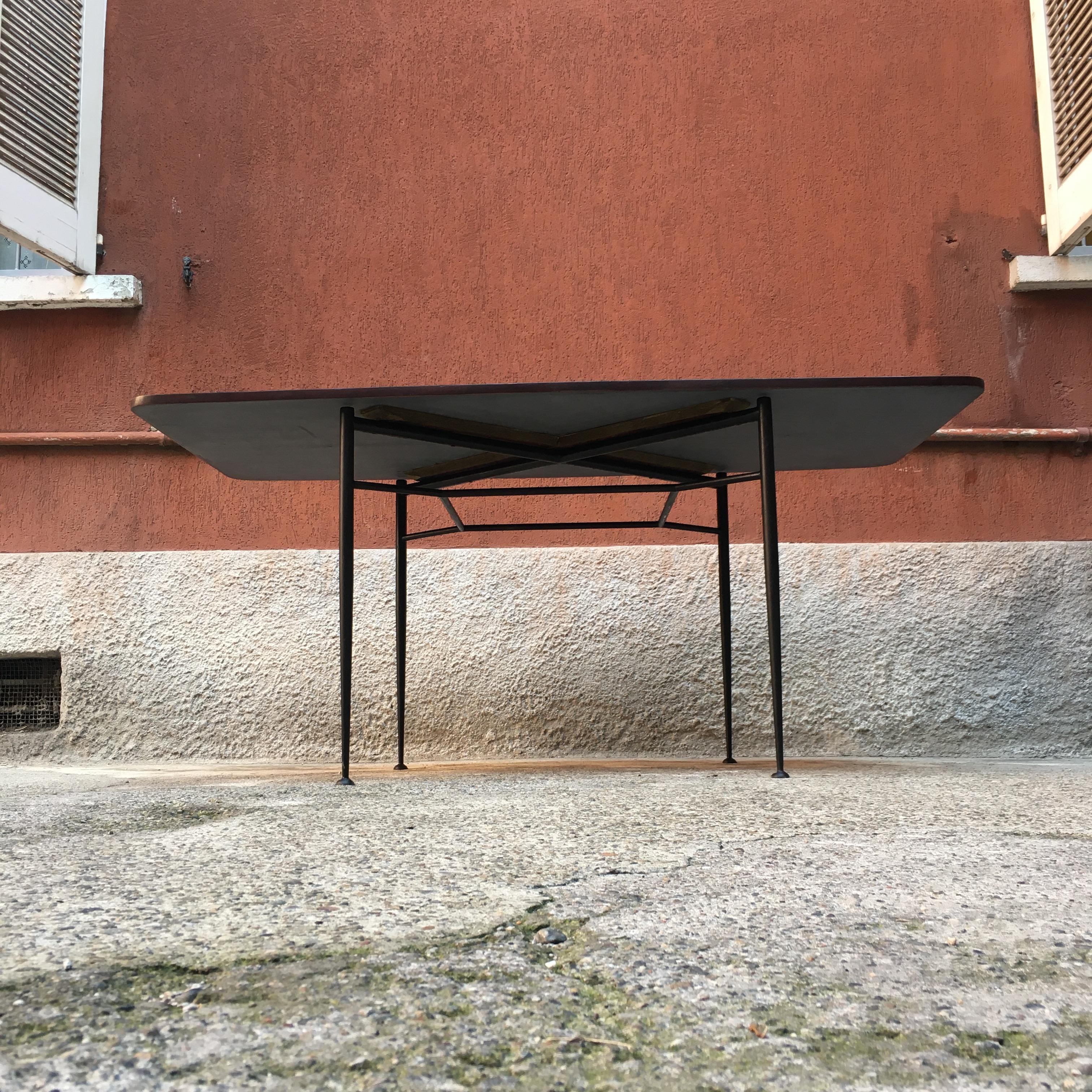 Italian Rosewood Top and Black Metal Paw Dining Table, 1960s In Excellent Condition In MIlano, IT