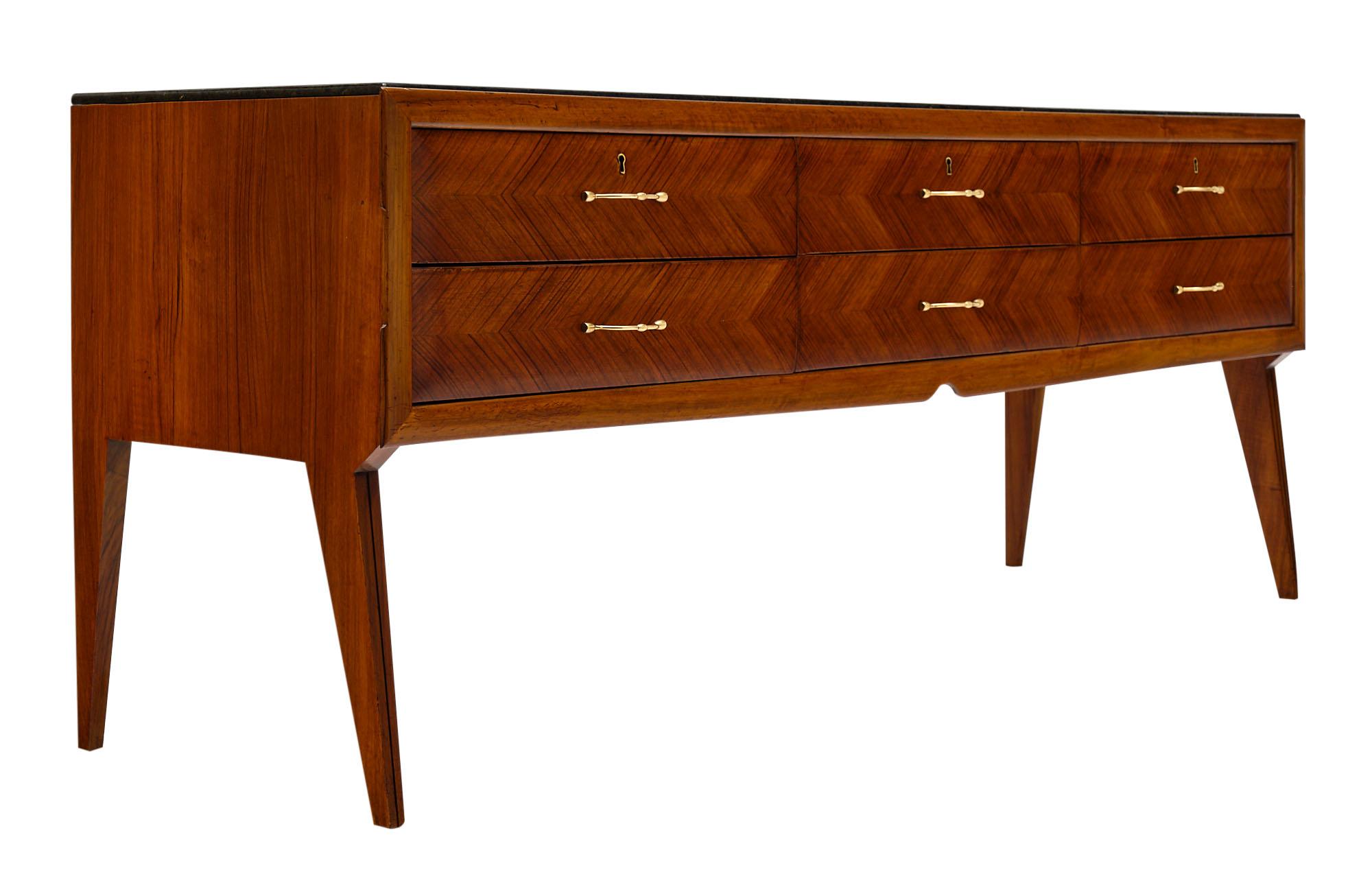 Italian rosewood vintage sideboard with tapered legs and topped with a beveled “terrazzo” granite. The rosewood front is beautifully parqueted and the piece has six drawers.