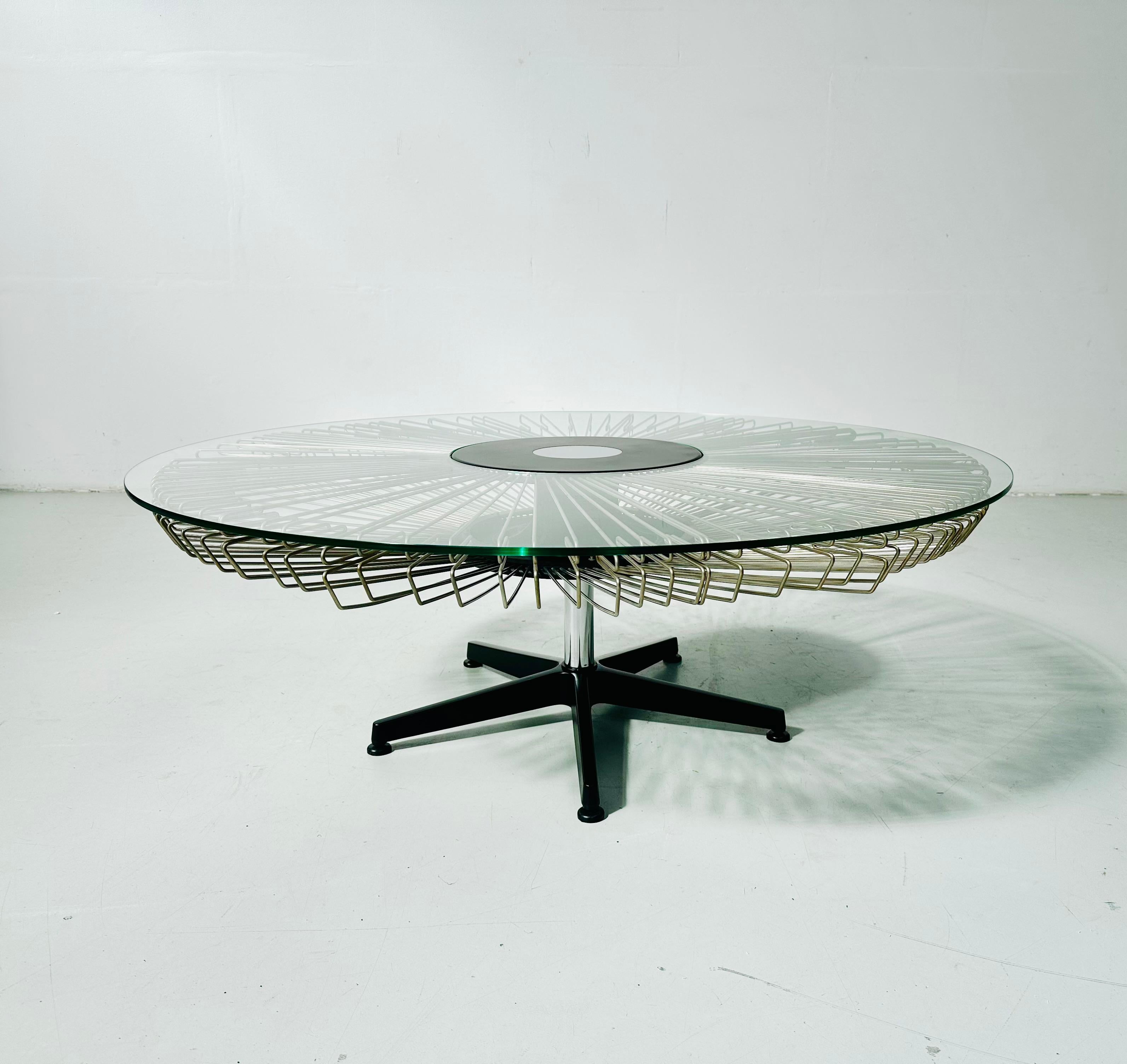 Italian Rotating Glass and Metal Coffee Table designed for Prada, 1990s. For Sale 5