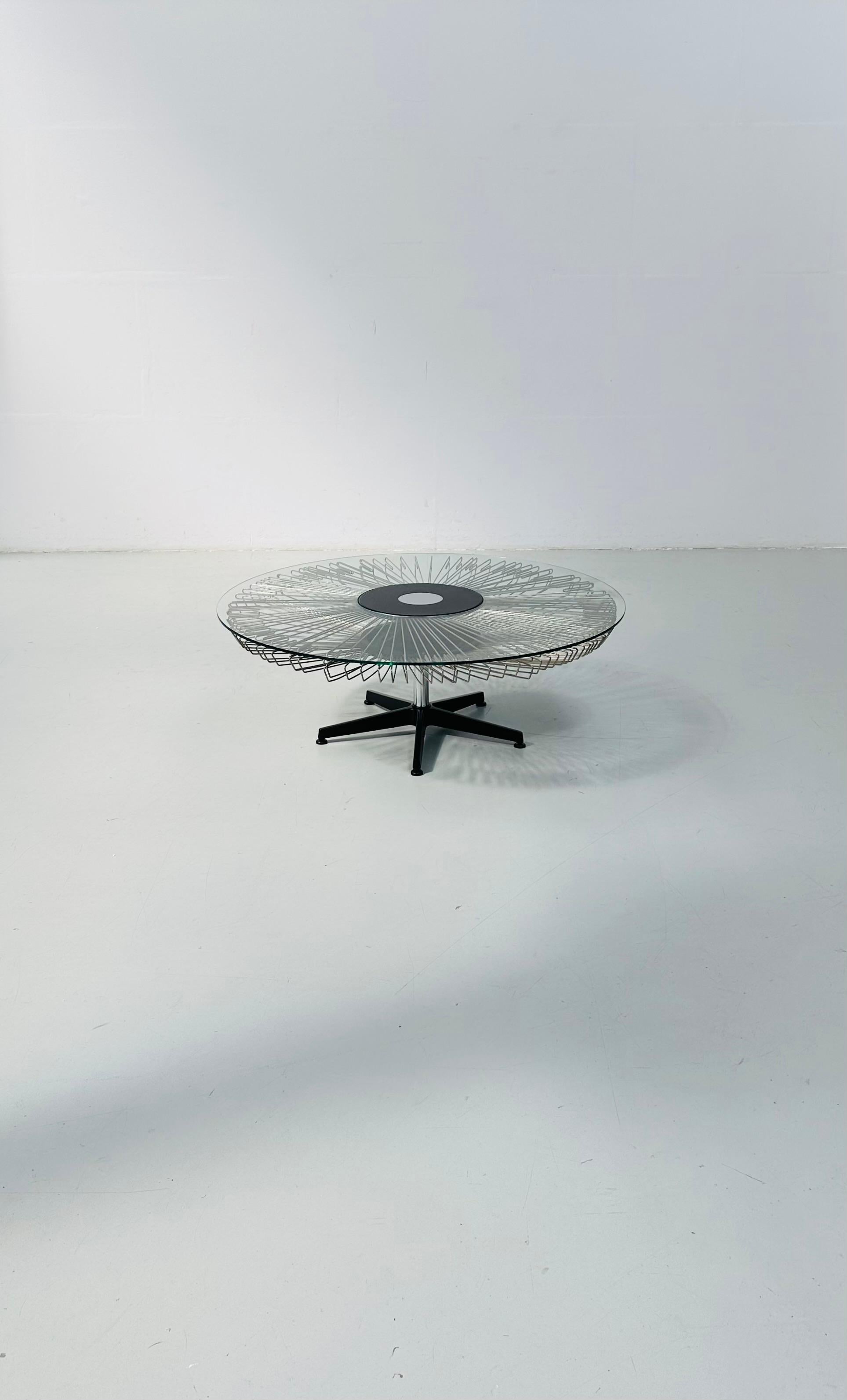Italian Rotating Glass and Metal Coffee Table designed for Prada, 1990s. For Sale 11