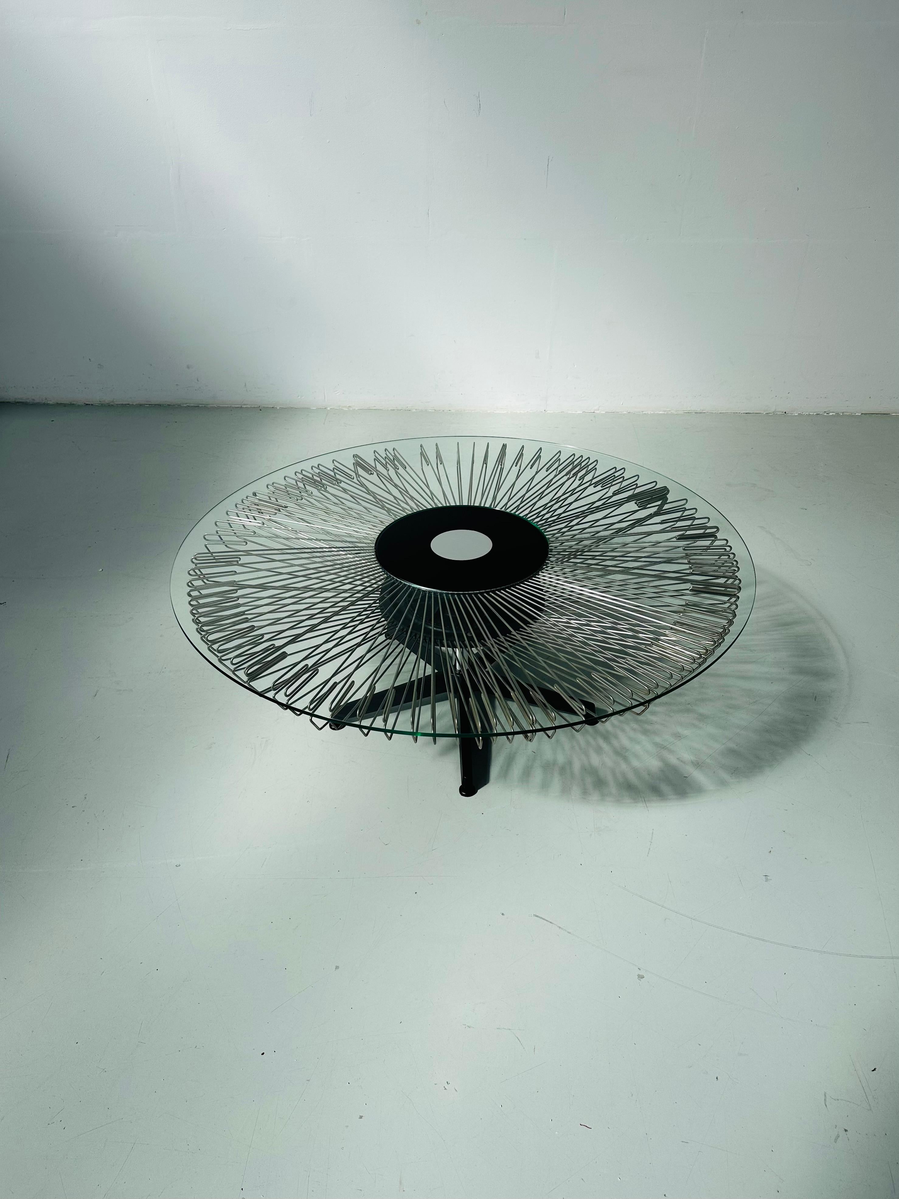Industrial Italian Rotating Glass and Metal Coffee Table designed for Prada, 1990s. For Sale