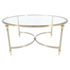 Table basse italienne ronde 38" chromée et laiton brossé avec lunette et pieds en verre MINT