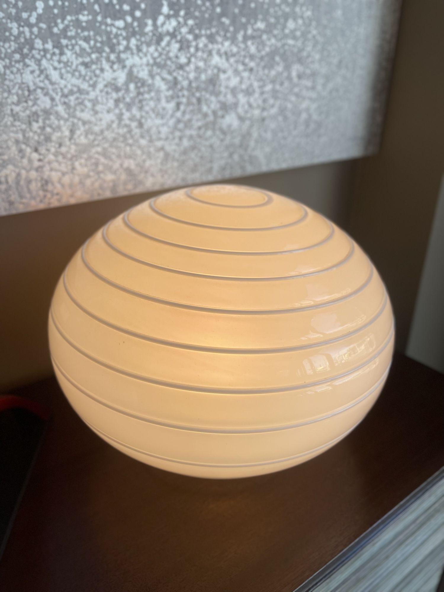 Modernist Italian round ball glass table lamp with swirl design. 

Dimensions:
 
13