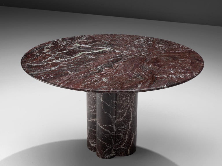 Round pedestal table, multicolored marble, Italy, 1960s. 

The round shaped marble top of this table shows a magnificent multi-color grain. 
The lines through the surfaces emphasize the almost theatrical appearance of this piece. The