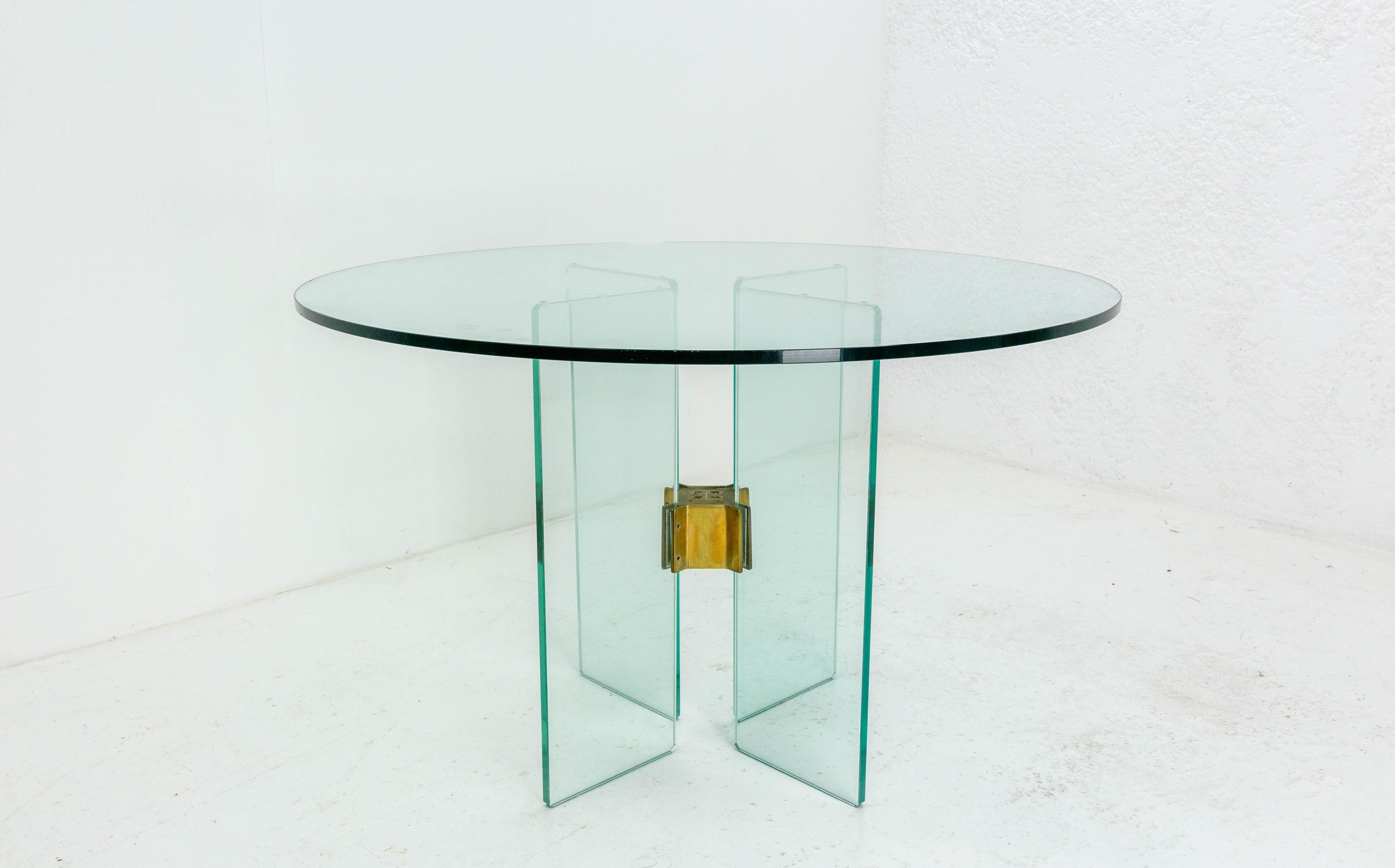 Italian glass and brass round dining table midcentury
Good condition

Shipping:
wooden case 120 / 17 /120 cm/ 95 kg.
  