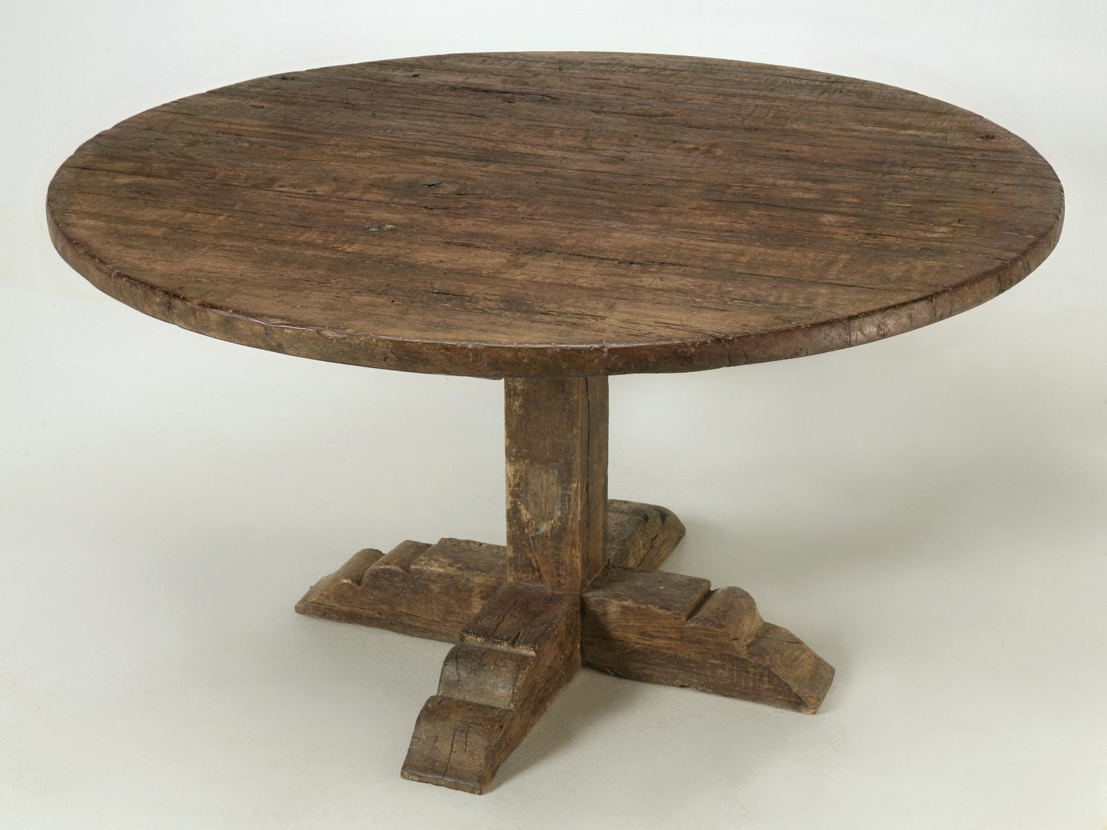 Our Old Plank Dining Room Table is an authentic reproduction of a circa 1840 Italian Round Dining or Kitchen Table and is constructed from reclaimed oak. Our Old Plank finishers used every ounce of their Artistry to make the Italian style Round